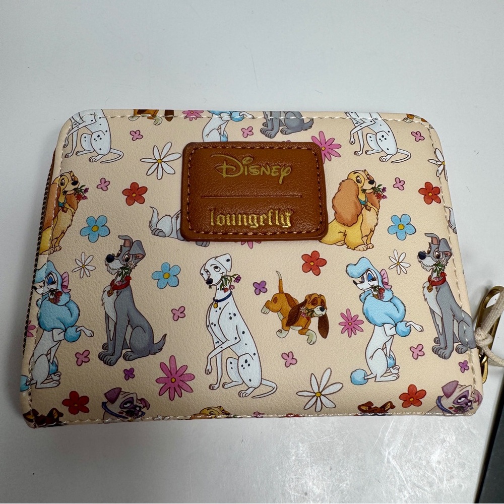 NWT Loungefly Disney Dogs Floral Mini Zipper Wallet. Who let the Disney dogs out